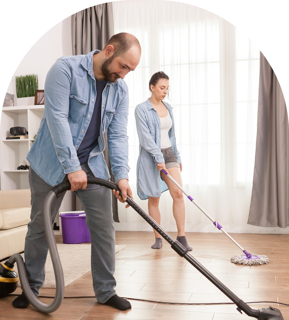 Professional cleaning team vacuuming and mopping home floors with care and pride by Brittany and Paul